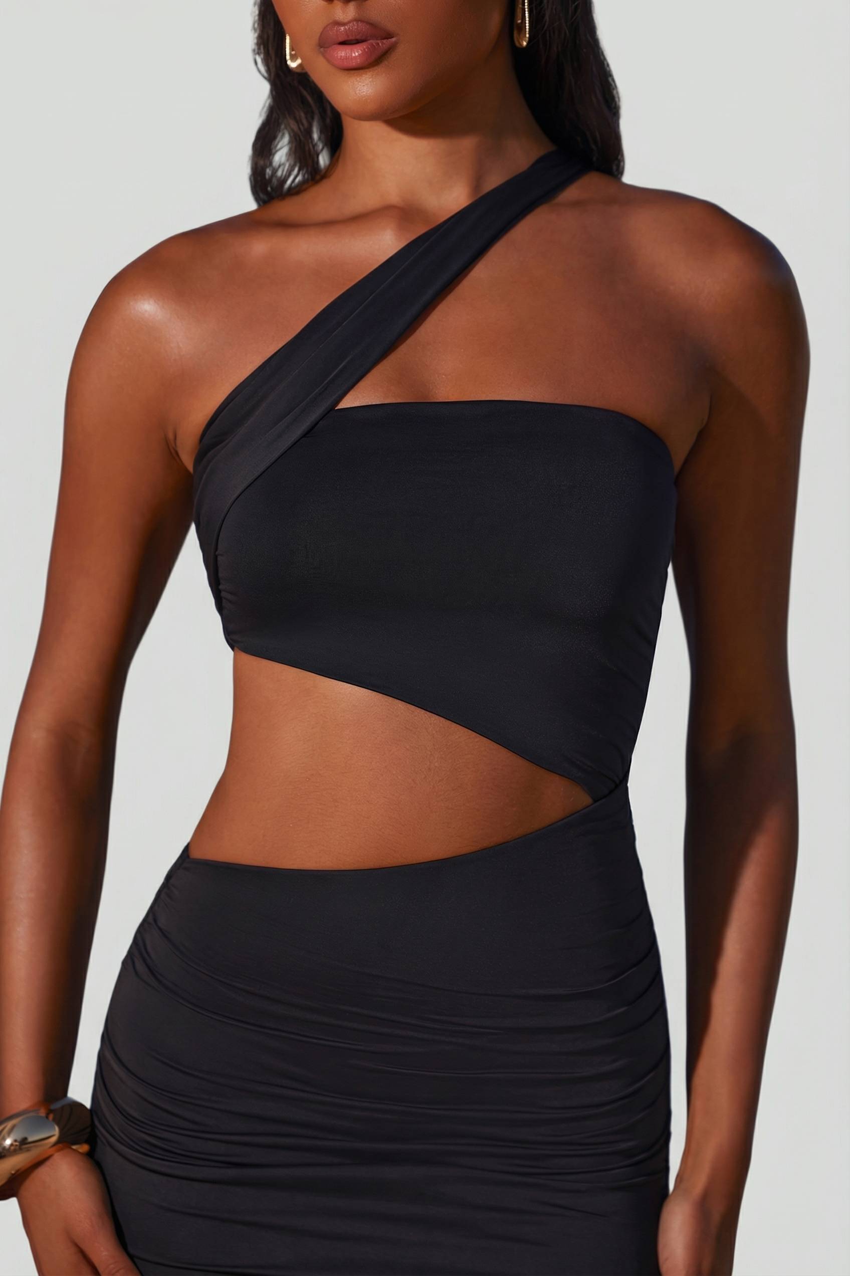 Suvi Asymmetric Neckline Ruched Cut Out Maxi Dress in Black | Oh Polly