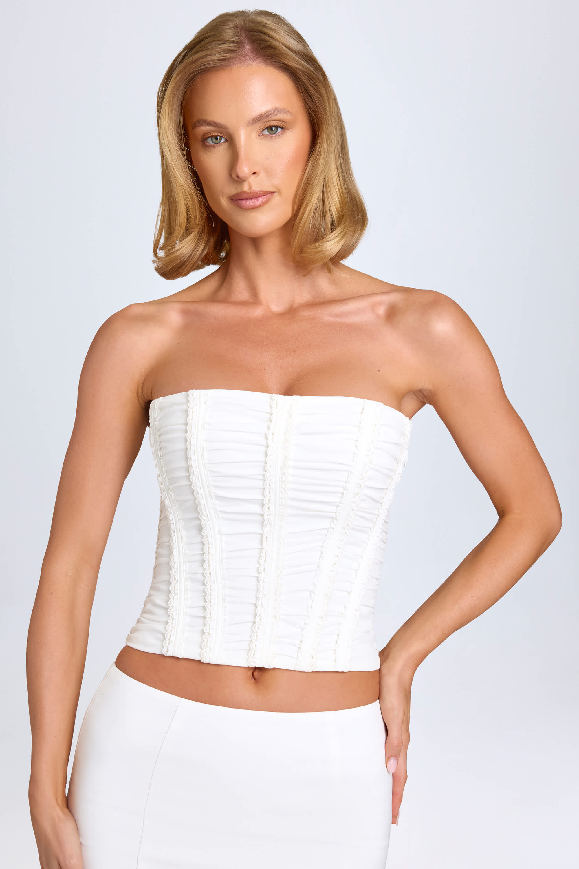 Trova Ruched Lace-Up Corset Top in White | Oh Polly